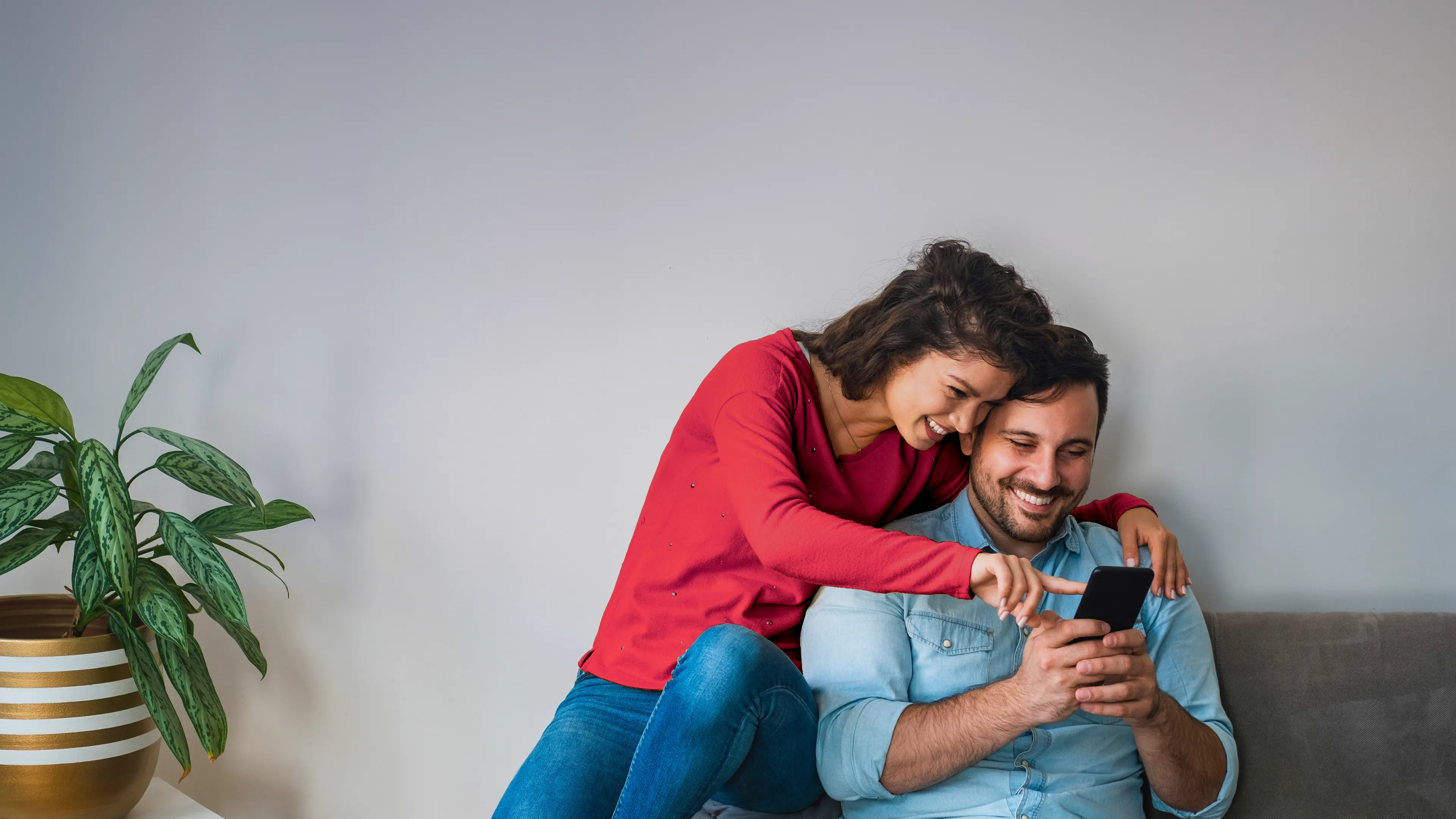 Couple buying tickets online using Little Box Office ticketing software.